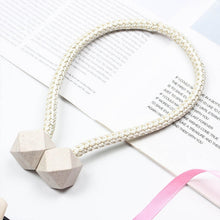 Magnetic curtain clips with straps, 2-piece set, stylish window decor.