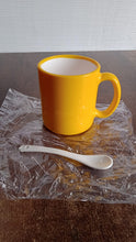 Elegant Ceramic Mug with Matching Spoon